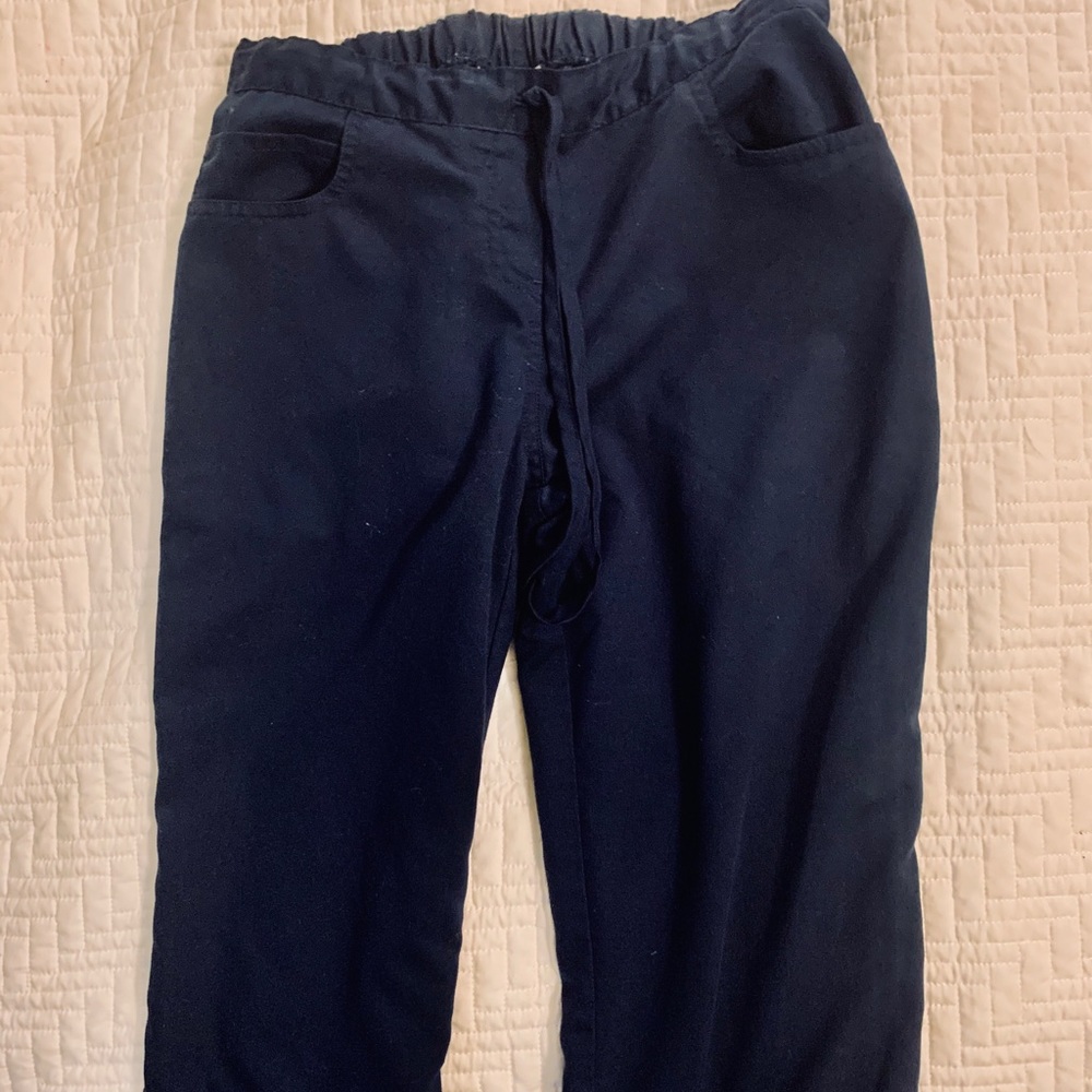 Grey’s Anatomy navy scrub pants.